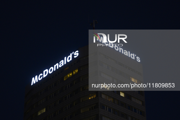 The signage of an American fast food chain McDonald's restaurant is pictured in Warsaw, Poland, on November 25, 2024. 