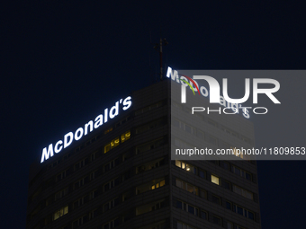 The signage of an American fast food chain McDonald's restaurant is pictured in Warsaw, Poland, on November 25, 2024. (