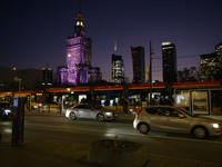 Cars and trams drive past the Palace of Culture and Science in Warsaw, Poland, on November 25, 2024. (