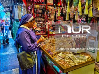 A nun shops at the Bhutia Bazaar (Tibetan Market) in Nainital, Uttarakhand, India, on April 19, 2024. The Tibetan Market is located by Naini...