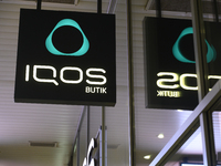 An Iqos store signage is pictured during Black Friday week in Warsaw, Poland, on November 25, 2024. (