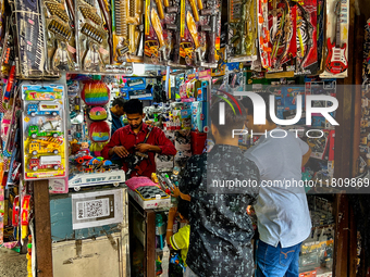 Youth buy toy guns at a shop in the Bhutia Bazaar (Tibetan Market) in Nainital, Uttarakhand, India, on April 19, 2024. The Tibetan Market is...