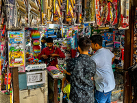 Youth buy toy guns at a shop in the Bhutia Bazaar (Tibetan Market) in Nainital, Uttarakhand, India, on April 19, 2024. The Tibetan Market is...