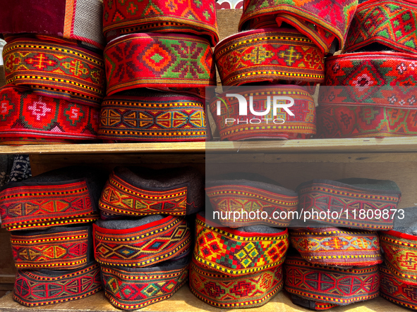 Traditional caps are displayed at a shop in the Bhutia Bazaar (Tibetan Market) in Nainital, Uttarakhand, India, on April 19, 2024. The Tibet...