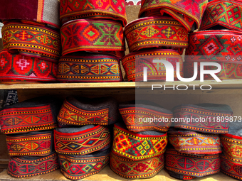 Traditional caps are displayed at a shop in the Bhutia Bazaar (Tibetan Market) in Nainital, Uttarakhand, India, on April 19, 2024. The Tibet...