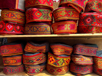 Traditional caps are displayed at a shop in the Bhutia Bazaar (Tibetan Market) in Nainital, Uttarakhand, India, on April 19, 2024. The Tibet...