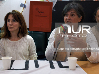 Alice Terrasse, a lawyer, and Christine Arrighi, an MP, are pictured during the press conference. People gather in Toulouse, France, on Nove...