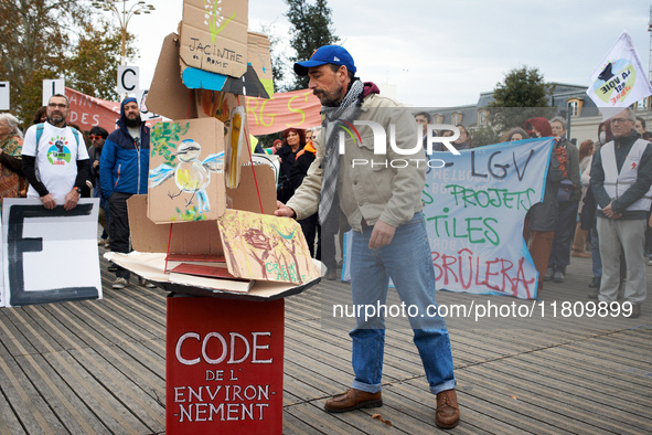 People gather in Toulouse, France, on November 25, 2024, as plaintiffs (LVEL, Attac, Amis de la Terre, D'Ingrando, etc.) against the planned...