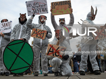 People from XR display placards against the A69 highway. People gather in Toulouse, France, on November 25, 2024, as plaintiffs (LVEL, Attac...