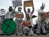 People from XR display placards against the A69 highway. People gather in Toulouse, France, on November 25, 2024, as plaintiffs (LVEL, Attac...