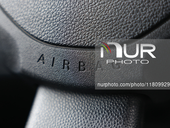 Airbag logo is seen on a steering wheel in Poland on November 24, 2024. (