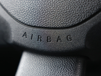 Airbag logo is seen on a steering wheel in Poland on November 24, 2024. (