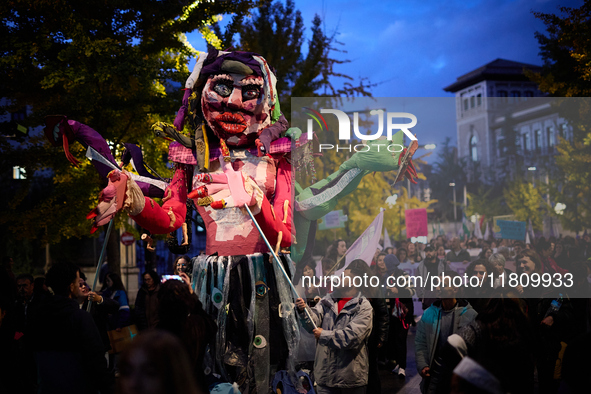 A giant doll made by students of a school represents women's freedom during the 25N demonstration, International Day for the Elimination of...