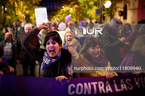 Protesters hold banners and shout slogans during the 25N demonstration, International Day for the Elimination of Violence against Women, in...