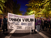 Protesters hold a banner reading 'They are not strangers, your friends also rape' and shout slogans during the 25N demonstration, Internatio...