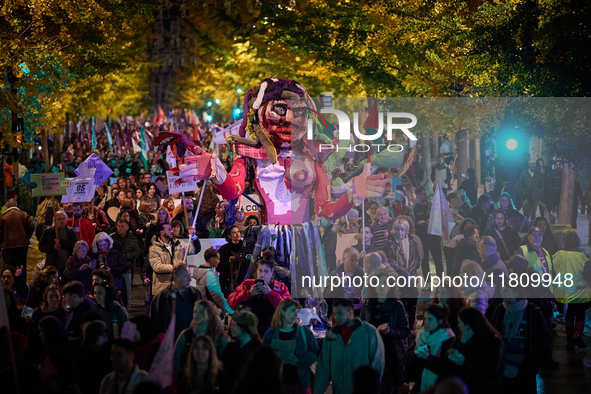 A giant doll made by students of a school represents women's freedom during the 25N demonstration, International Day for the Elimination of...