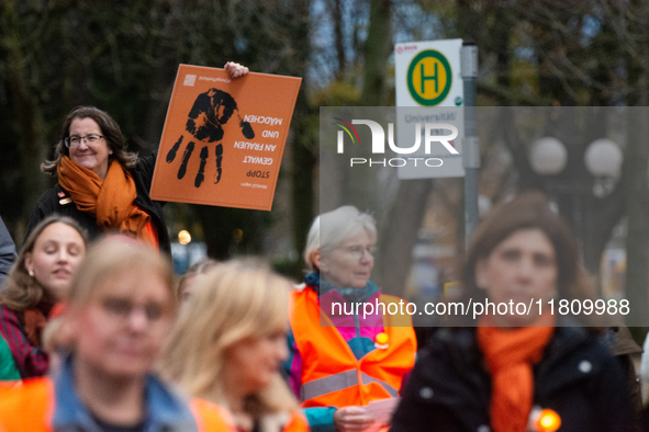 A hundred participants take part in a demonstration for International Women's Day in Bonn, Germany, on November 25, 2024, to raise awareness...