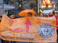 A hundred participants take part in a demonstration for International Women's Day in Bonn, Germany, on November 25, 2024, to raise awareness...