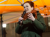 Katja Dorner, the mayor of Bonn, speaks during the candlelight vigil in front of Bonn Town Hall as hundreds of participants take part in a d...