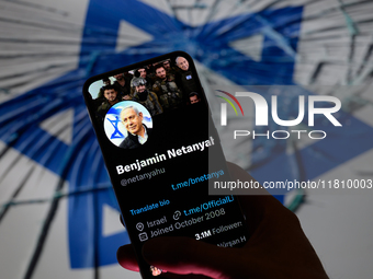 Benjamin Netanyahu's social media is displayed on a smartphone with the flag of Israel visible in the background in this photo illustration...