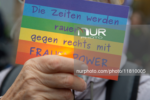 A hundred participants take part in a demonstration for International Women's Day in Bonn, Germany, on November 25, 2024, to raise awareness...