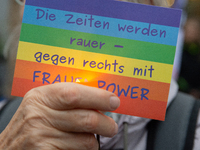 A hundred participants take part in a demonstration for International Women's Day in Bonn, Germany, on November 25, 2024, to raise awareness...