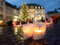 365 candles with the symbol of a woman are illuminated in front of the Townhall as hundreds of participants take part in a demonstration for...