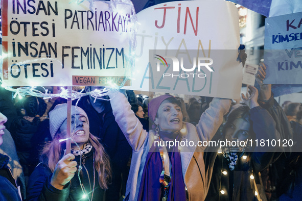 Women attend a demonstration to mark the International Day for the Elimination of Violence against Women near Istiklal Avenue in Istanbul, T...