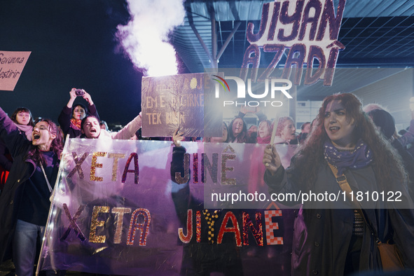 Women attend a demonstration to mark the International Day for the Elimination of Violence against Women near Istiklal Avenue in Istanbul, T...