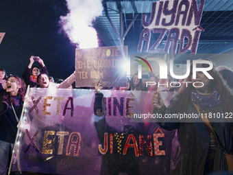 Women attend a demonstration to mark the International Day for the Elimination of Violence against Women near Istiklal Avenue in Istanbul, T...