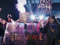 Women attend a demonstration to mark the International Day for the Elimination of Violence against Women near Istiklal Avenue in Istanbul, T...