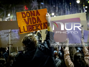 Thousands of women demonstrate in Barcelona, Catalonia, Spain, on November 25, 2024, convened by various parties, unions, and feminist organ...