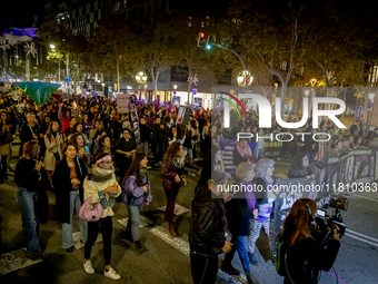 Thousands of women demonstrate in Barcelona, Catalonia, Spain, on November 25, 2024, convened by various parties, unions, and feminist organ...