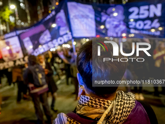 Thousands of women demonstrate in Barcelona, Catalonia, Spain, on November 25, 2024, convened by various parties, unions, and feminist organ...