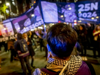 Thousands of women demonstrate in Barcelona, Catalonia, Spain, on November 25, 2024, convened by various parties, unions, and feminist organ...