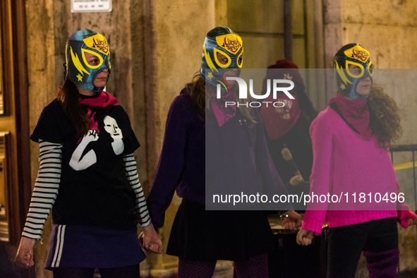 Participants gather for the demonstration on the occasion of the International Day for the Elimination of Violence against Women outside Mon...