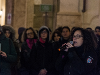 Participants gather for the demonstration on the occasion of the International Day for the Elimination of Violence against Women outside Mon...