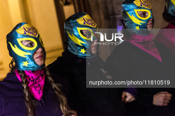 Participants gather for the demonstration on the occasion of the International Day for the Elimination of Violence against Women outside Mon...