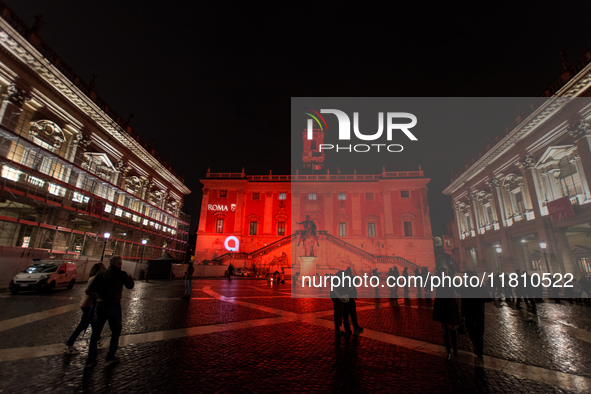 The facade of the Palazzo Senatorio of the Campidoglio in Rome, seat of the municipal administration, is lit up in red on the occasion of th...