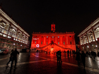 The facade of the Palazzo Senatorio of the Campidoglio in Rome, seat of the municipal administration, is lit up in red on the occasion of th...