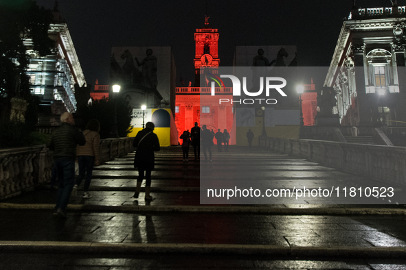 The facade of the Palazzo Senatorio of the Campidoglio in Rome, seat of the municipal administration, is lit up in red on the occasion of th...