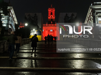 The facade of the Palazzo Senatorio of the Campidoglio in Rome, seat of the municipal administration, is lit up in red on the occasion of th...