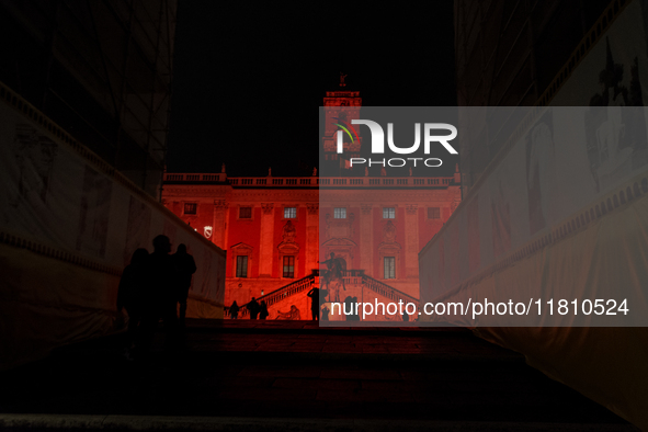 The facade of the Palazzo Senatorio of the Campidoglio in Rome, seat of the municipal administration, is lit up in red on the occasion of th...