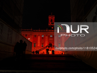 The facade of the Palazzo Senatorio of the Campidoglio in Rome, seat of the municipal administration, is lit up in red on the occasion of th...