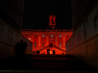 The facade of the Palazzo Senatorio of the Campidoglio in Rome, seat of the municipal administration, is lit up in red on the occasion of th...