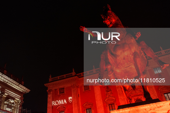 The facade of the Palazzo Senatorio of the Campidoglio in Rome, seat of the municipal administration, is lit up in red on the occasion of th...