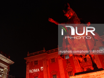 The facade of the Palazzo Senatorio of the Campidoglio in Rome, seat of the municipal administration, is lit up in red on the occasion of th...