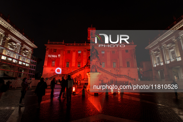 The facade of the Palazzo Senatorio of the Campidoglio in Rome, seat of the municipal administration, is lit up in red on the occasion of th...