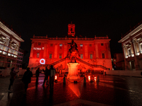 The facade of the Palazzo Senatorio of the Campidoglio in Rome, seat of the municipal administration, is lit up in red on the occasion of th...