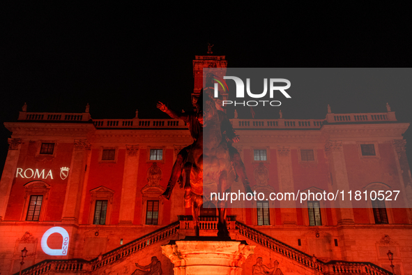 The facade of the Palazzo Senatorio of the Campidoglio in Rome, seat of the municipal administration, is lit up in red on the occasion of th...